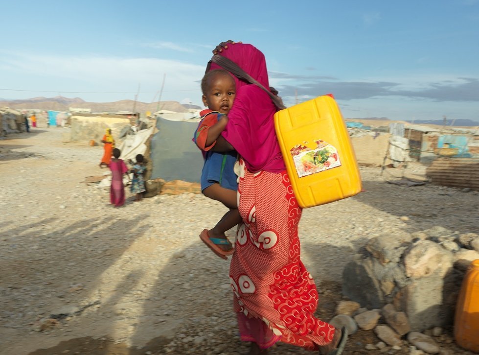 In the Somalian drought women and girls are walking for hours searching for clean water.